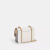 Bolso bandolera Klare en Signature Canvas