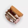 Bolso bandolera Klare en Signature Canvas con Charms