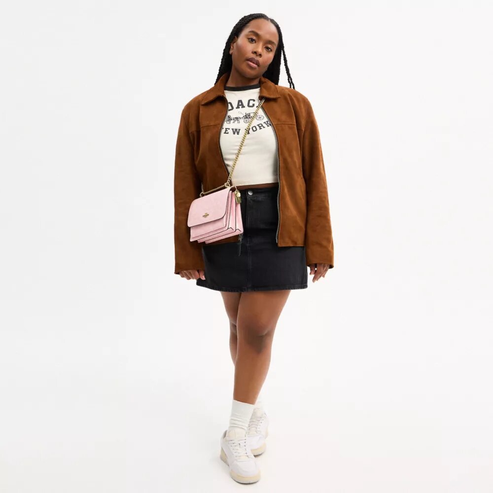 Bolso bandolera Klare en Signature Canvas con Charms