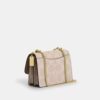 Bolso bandolera Klare en Signature Canvas con diseño en bloques característico