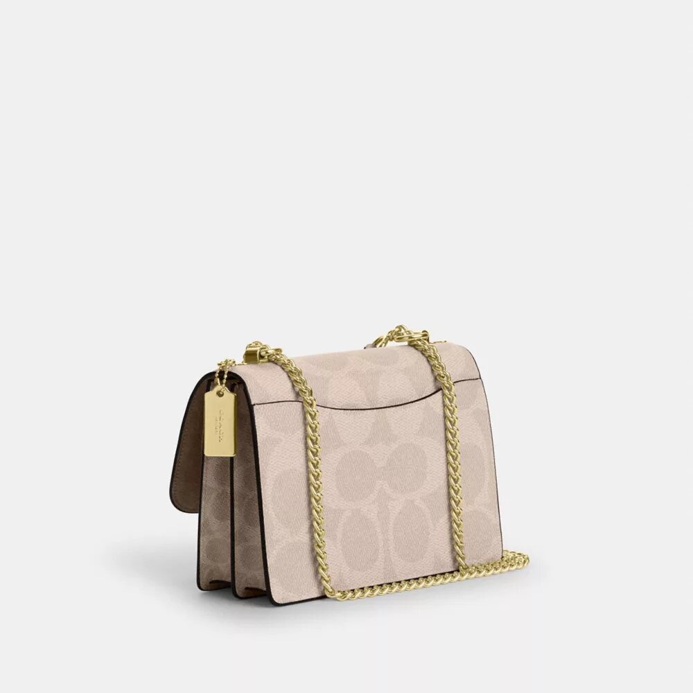 Bolso bandolera Klare en Signature Canvas con diseño en bloques característico
