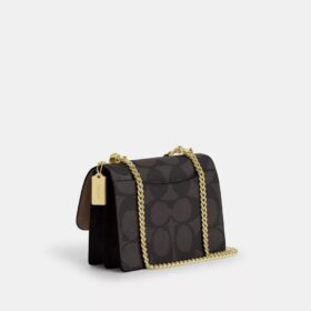 Bolso bandolera Klare en Signature Canvas con diseño en bloques característico