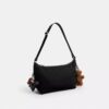Bolso bandolera Leo en Nailon exclusivo con Charms