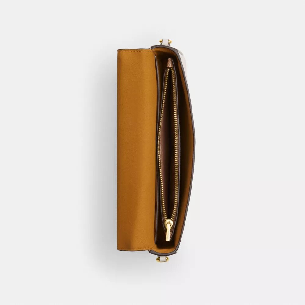 Bolso bandolera Mila con Signature Canvas