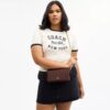 Bolso bandolera Mila con Signature Canvas