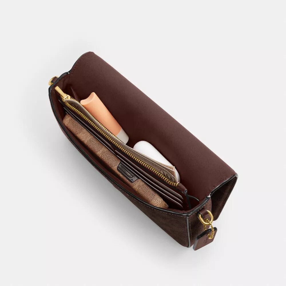 Bolso bandolera Mila en Signature Canvas