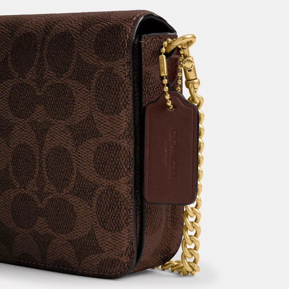 Bolso bandolera Mila en Signature Canvas