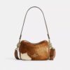 Bolso bandolera Mini Carey de piel de ternero con estampado de vaca