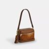 Bolso bandolera Mini Carey de piel de ternero con estampado de vaca