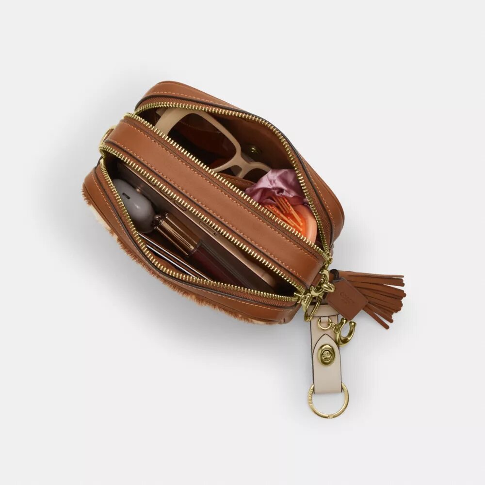 Bolso bandolera Mini Carey de piel de ternero con estampado de vaca
