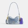 Bolso bandolera Mini Carey en denim desgastado con Charms