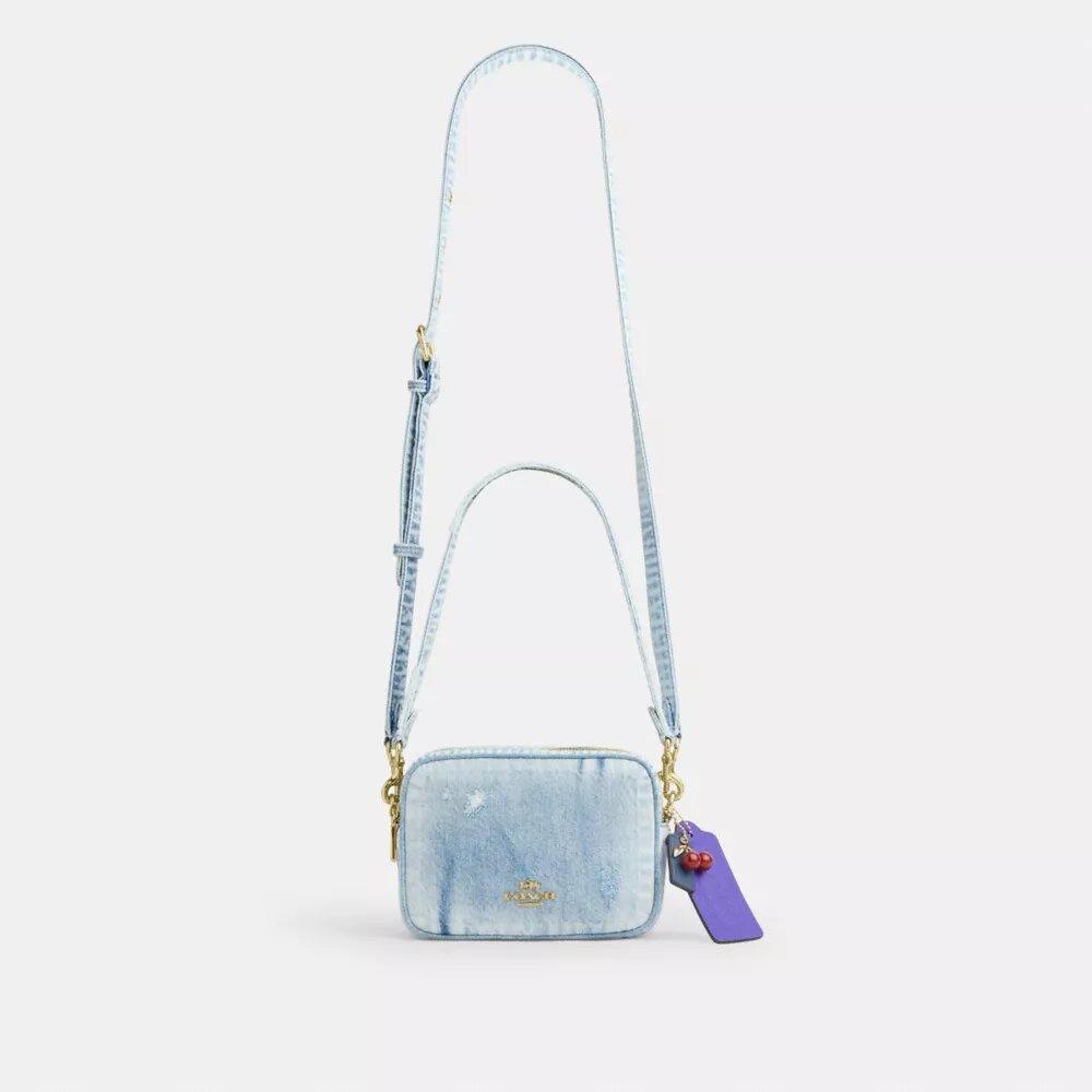 Bolso bandolera Mini Carey en denim desgastado con Charms