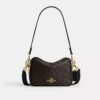 Bolso bandolera Mini Carey en Signature Canvas