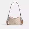 Bolso bandolera Mini Carey en Signature Canvas