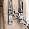 Bolso bandolera Mini Carey en Signature Canvas