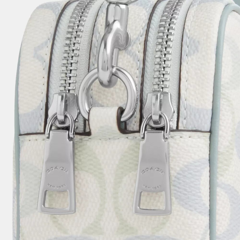 Bolso bandolera Mini Carey en Signature Canvas