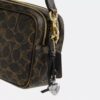 Bolso bandolera Mini Carey en Signature Canvas