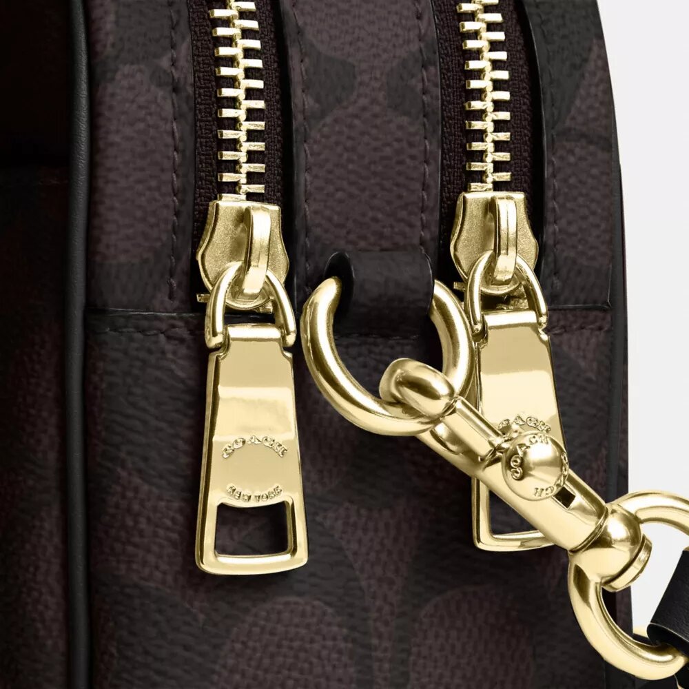 Bolso bandolera Mini Carey en Signature Canvas