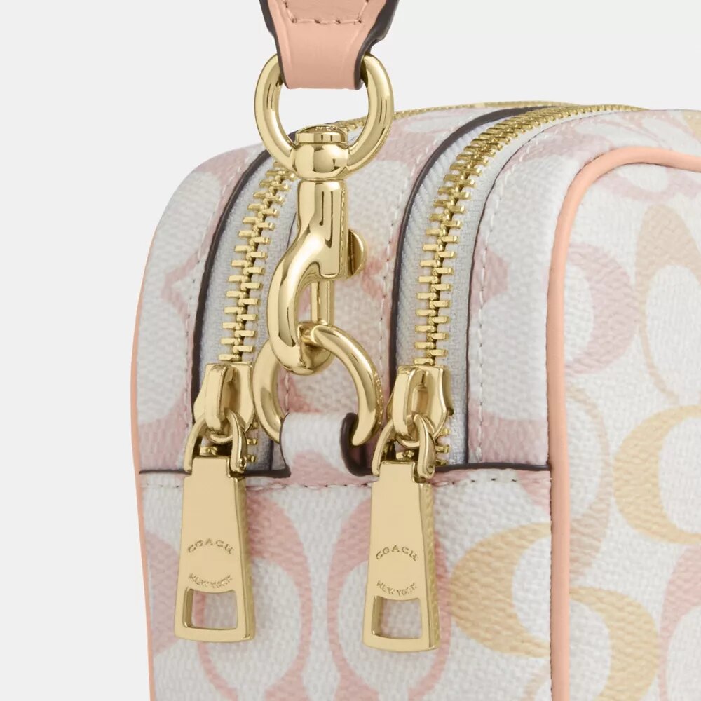 Bolso bandolera Mini Carey en Signature Canvas