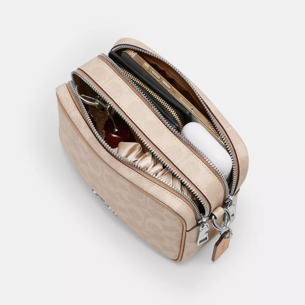 Bolso bandolera Mini Carey en Signature Canvas