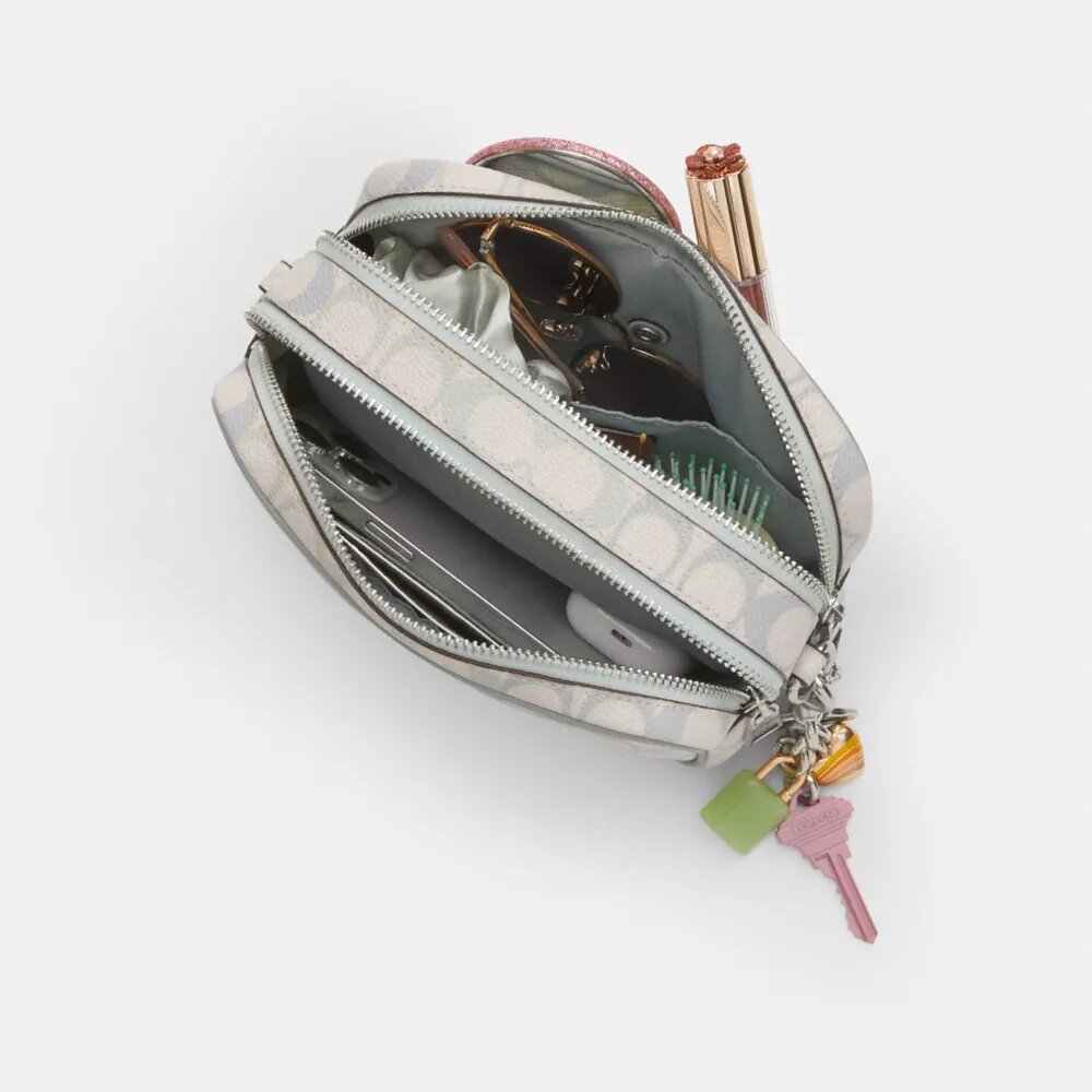 Bolso bandolera Mini Carey en Signature Canvas