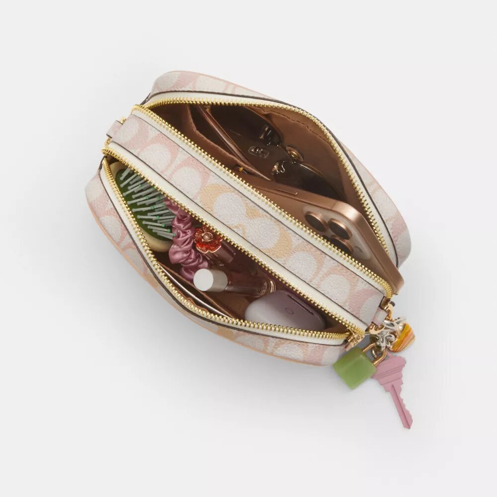 Bolso bandolera Mini Carey en Signature Canvas