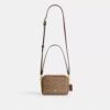 Bolso bandolera Mini Carey en Signature Canvas