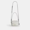 Bolso bandolera Mini Carey en Signature Canvas