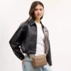 Bolso bandolera Mini Carey en Signature Canvas