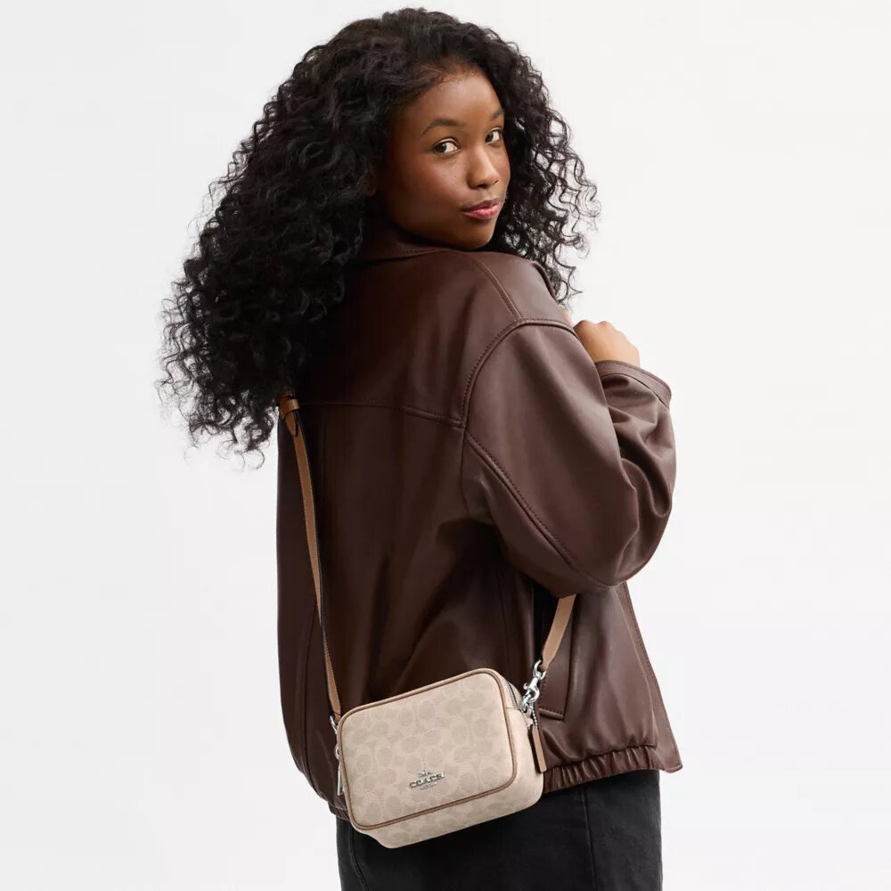 Bolso bandolera Mini Carey en Signature Canvas