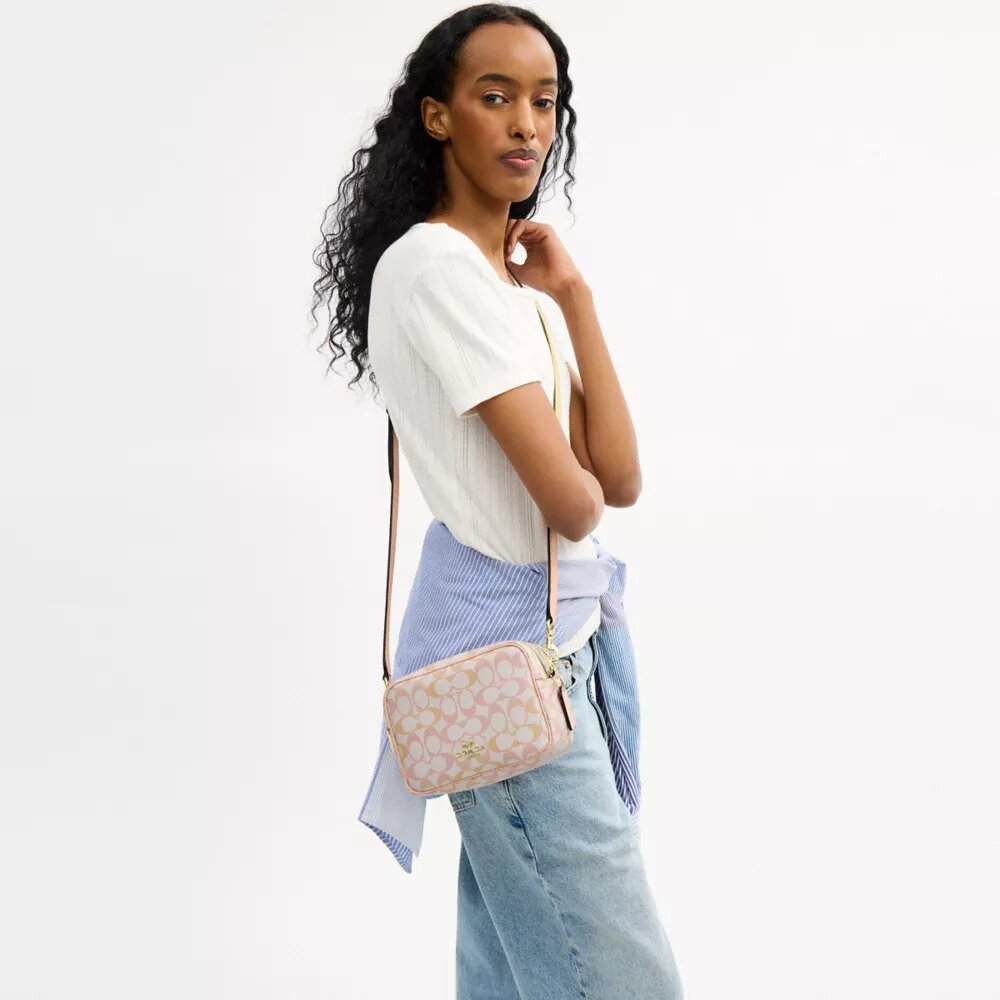 Bolso bandolera Mini Carey en Signature Canvas