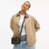 Bolso bandolera Mini Carey en Signature Canvas