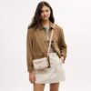 Bolso bandolera Mini Carey en Signature Canvas