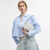 Bolso bandolera Mini Carey en Signature Canvas