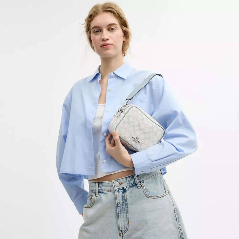 Bolso bandolera Mini Carey en Signature Canvas