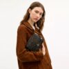 Bolso bandolera Mini Carey en Signature Canvas