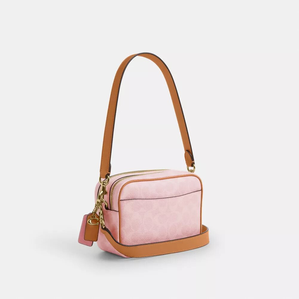 Bolso bandolera Mini Carey en Signature Canvas con Charms