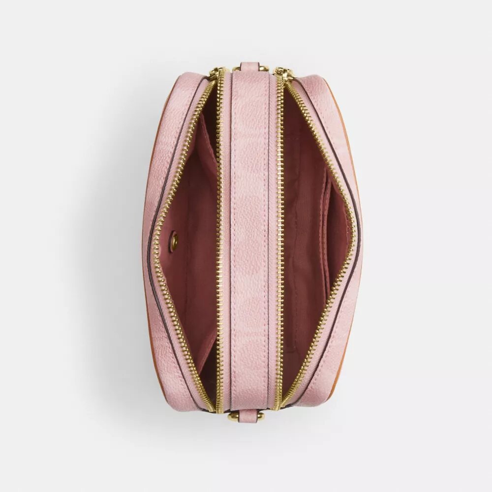 Bolso bandolera Mini Carey en Signature Canvas con Charms