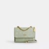 Bolso bandolera Mini Klare con estampado floral