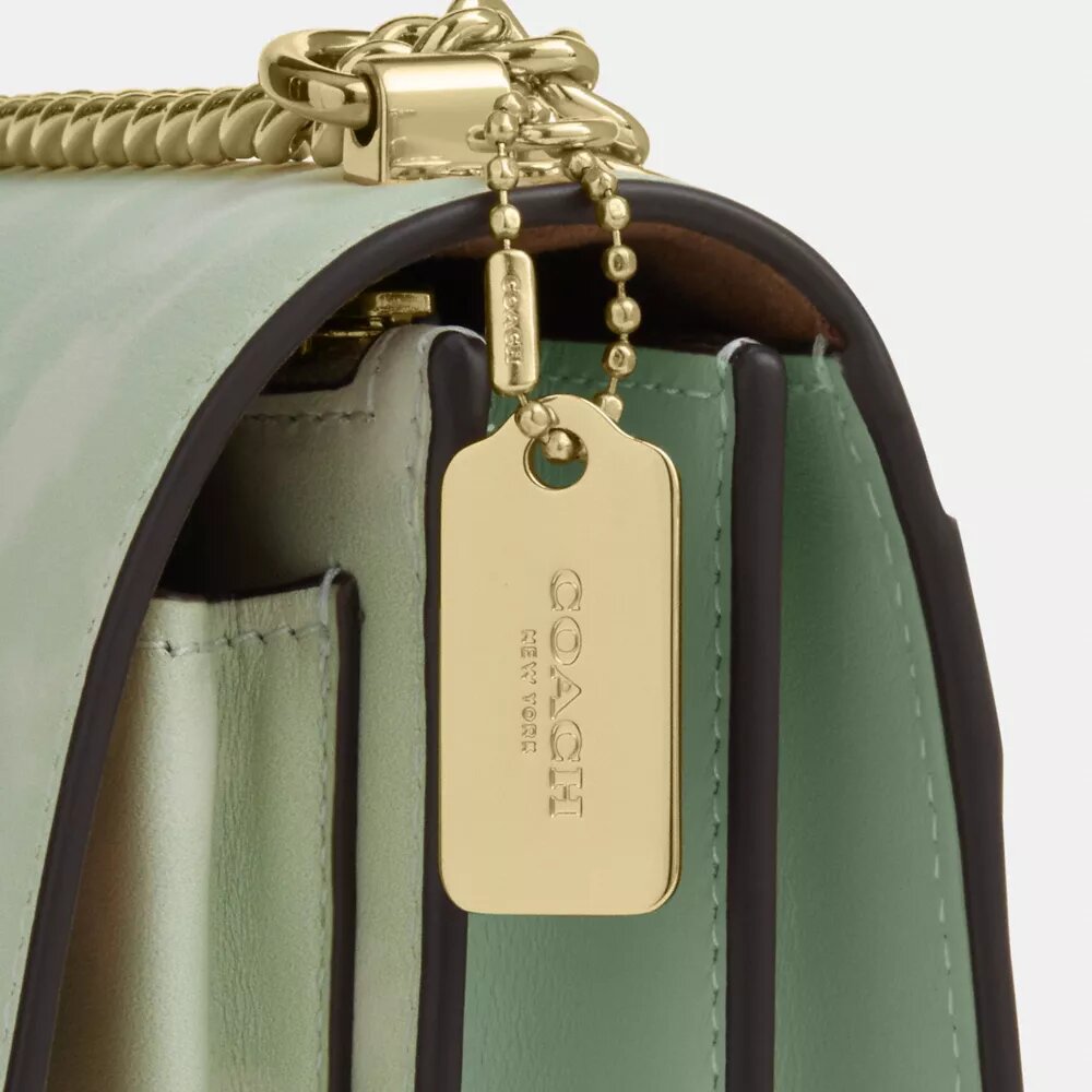 Bolso bandolera Mini Klare con estampado floral