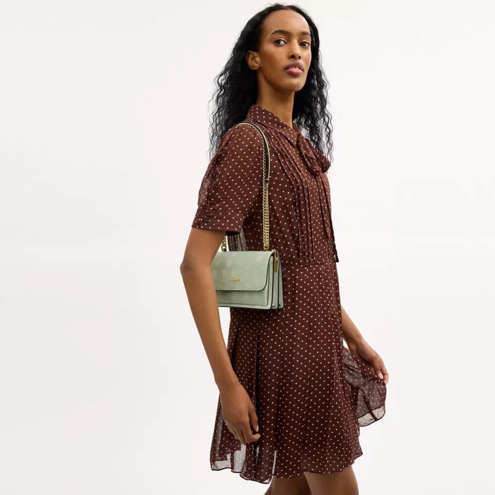 Bolso bandolera Mini Klare con estampado floral