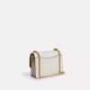 Bolso bandolera Mini Klare en Signature Canvas