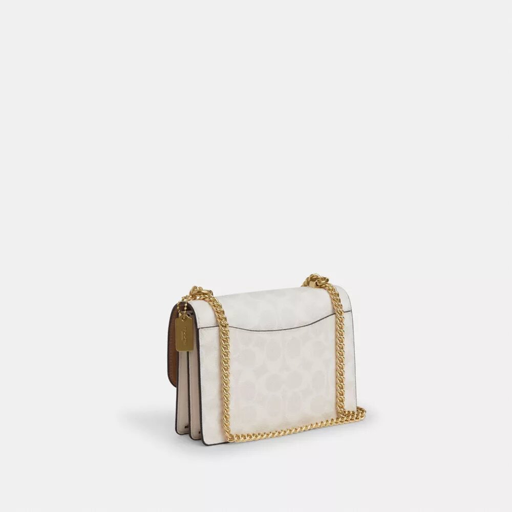 Bolso bandolera Mini Klare en Signature Canvas