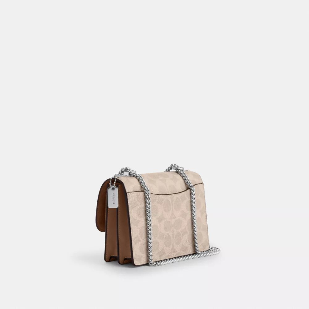 Bolso bandolera Mini Klare en Signature Canvas