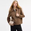 Bolso bandolera Mini Klare en Signature Canvas