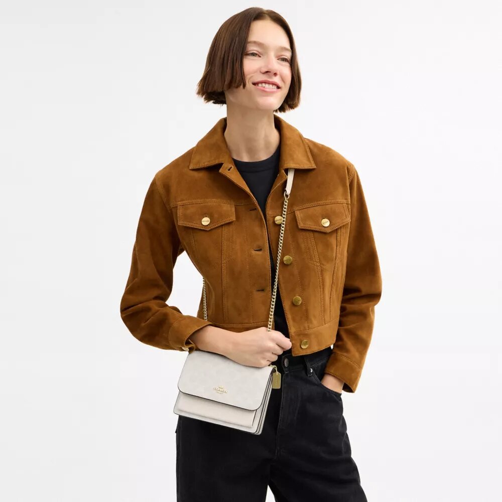 Bolso bandolera Mini Klare en Signature Canvas