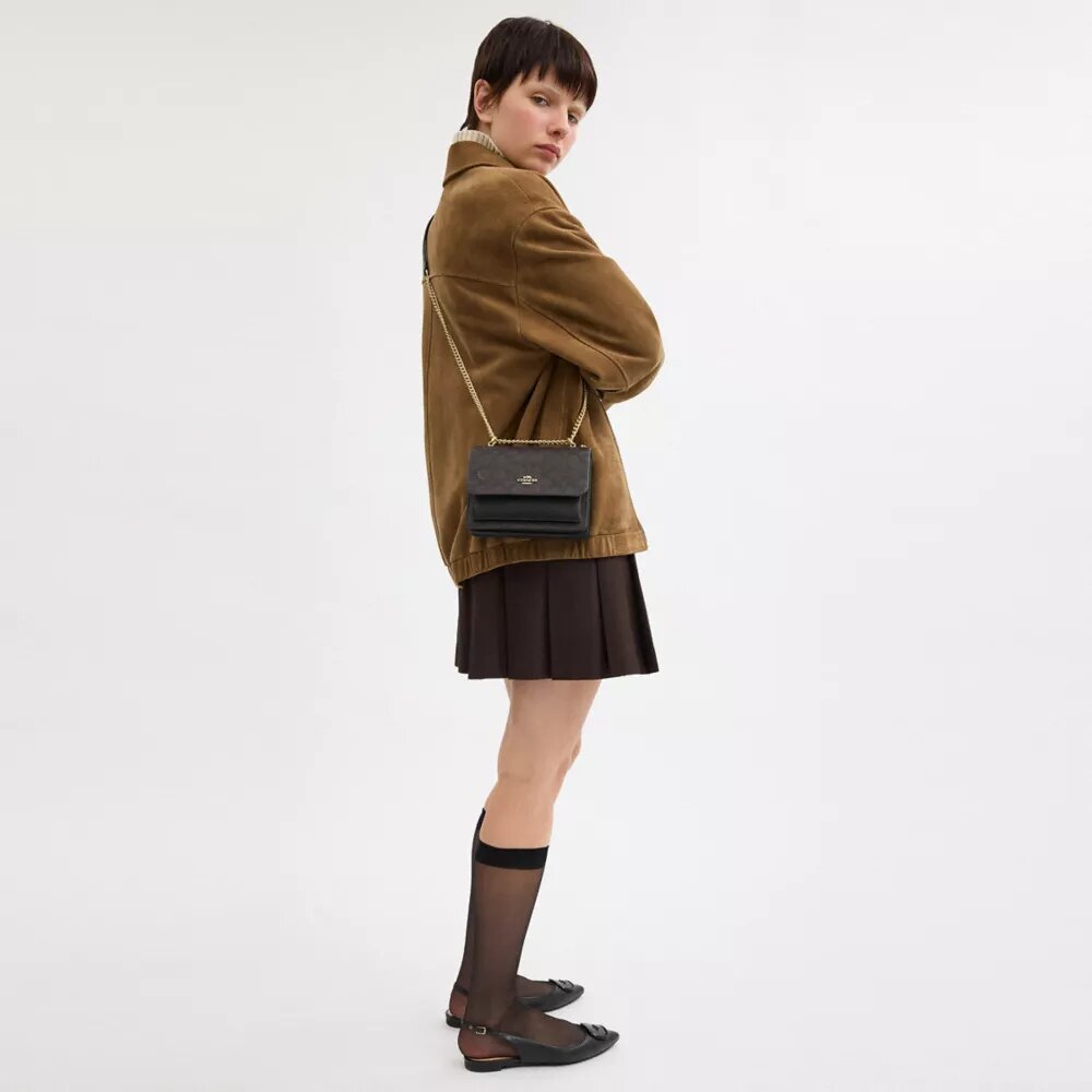 Bolso bandolera Mini Klare en Signature Canvas