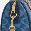 Bolso bandolera Mini Rowan en denim característico