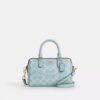 Bolso bandolera Mini Rowan en Signature Canvas