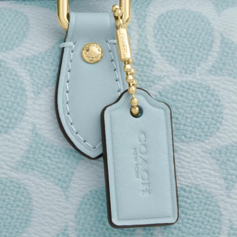 Bolso bandolera Mini Rowan en Signature Canvas